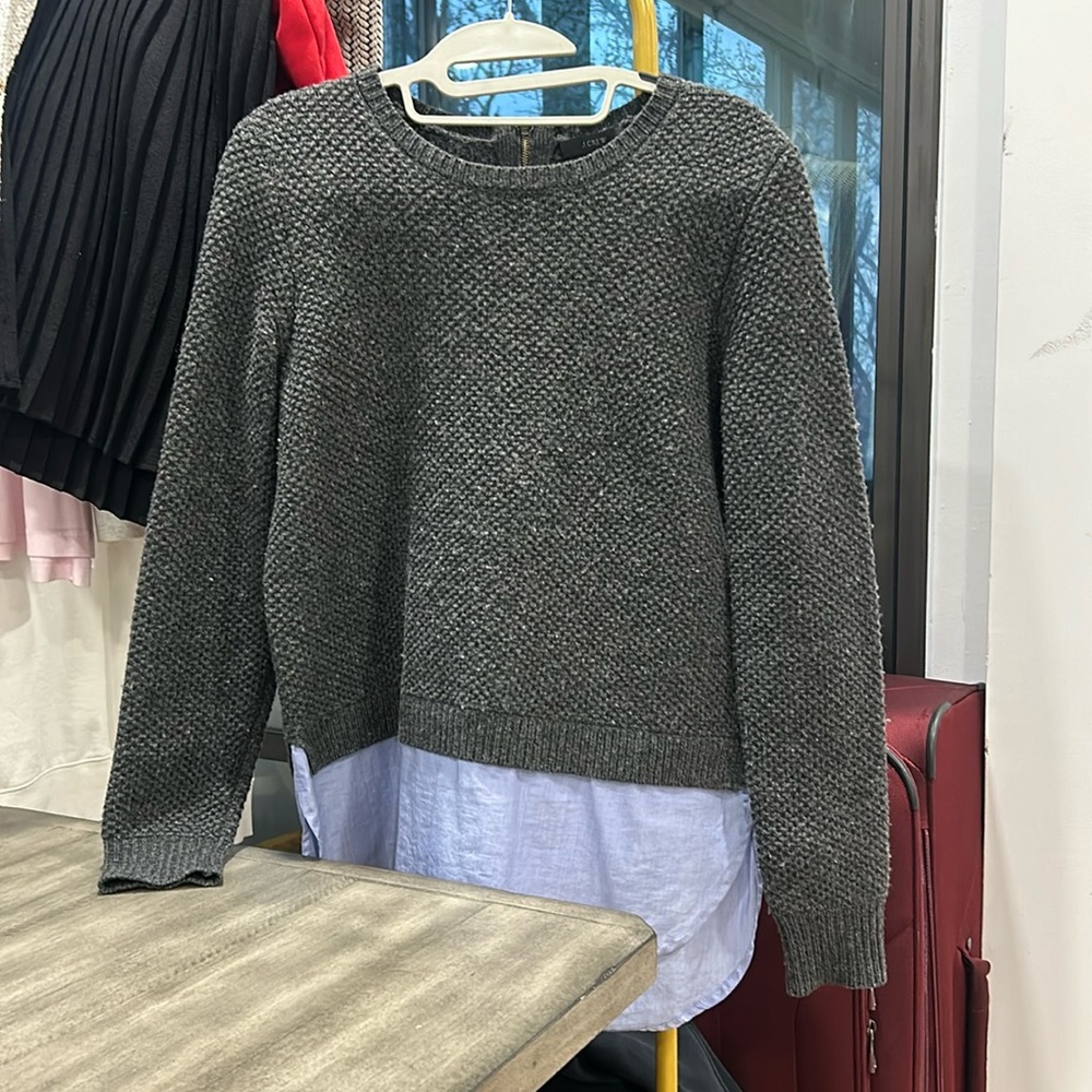 Grey sweater with flannel material attached to bottom!